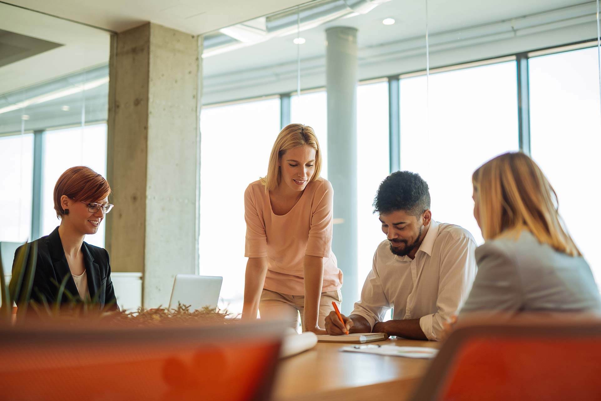 Government Officials discussing the use of Benchmarking Software
